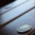 Moneta da 5 lire con dettagli preziosi, simbolo di valore numismatico e rarità.